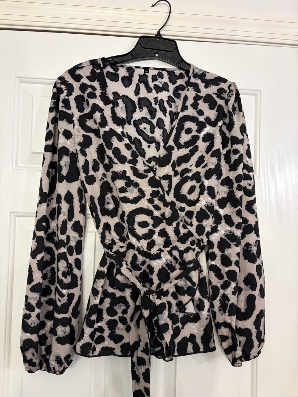 Animal Print Wrap Blouse in Black and Cream